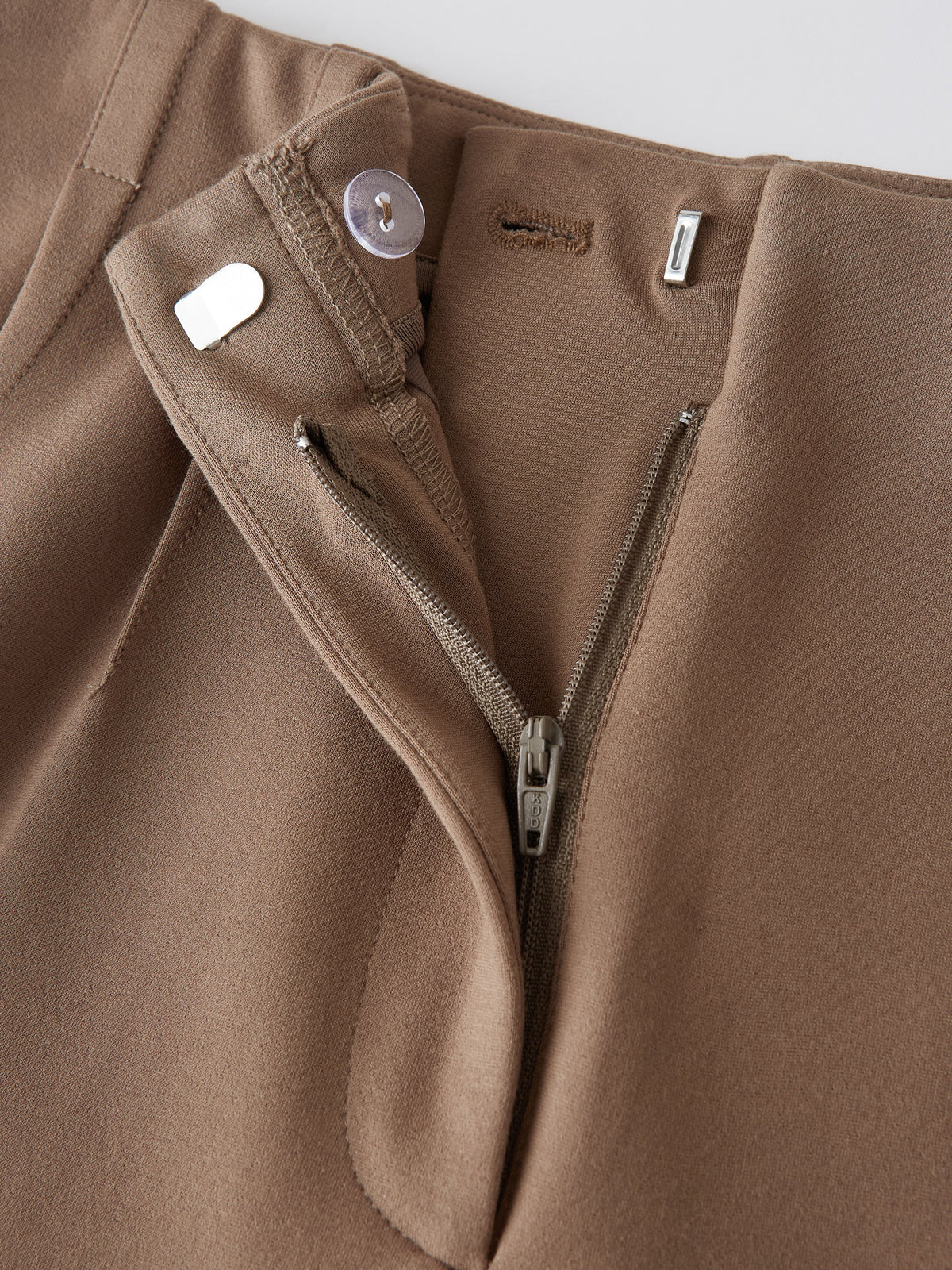 Ponte Mid-Rise Ankled Tapered Tuck Pants with Pockets — original photo 10